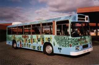 Bus49 carrying advertising for Metro.